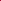 Close-up of a red fabric with embroidered floral design and 'Roberto Verino' branding.
