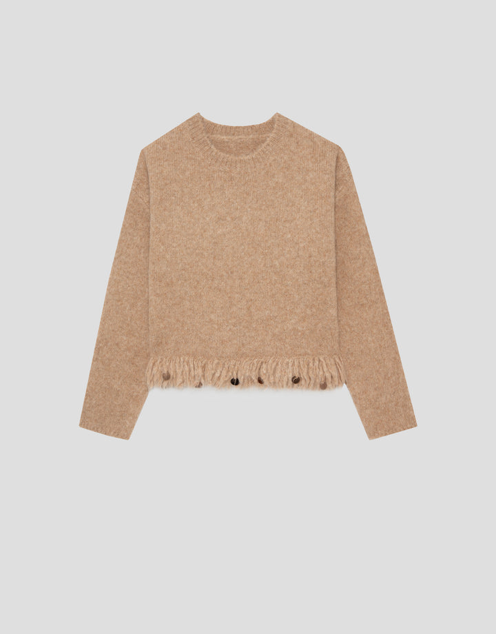 Beige sweater with frayed hem on a light gray background