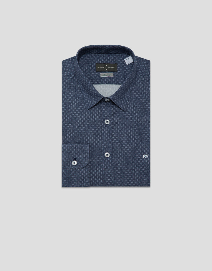Navy patterned shirt on a light gray background