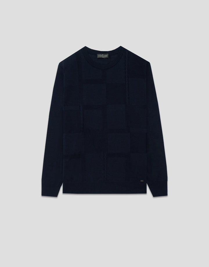 Dark blue quilted jacket on a light gray background