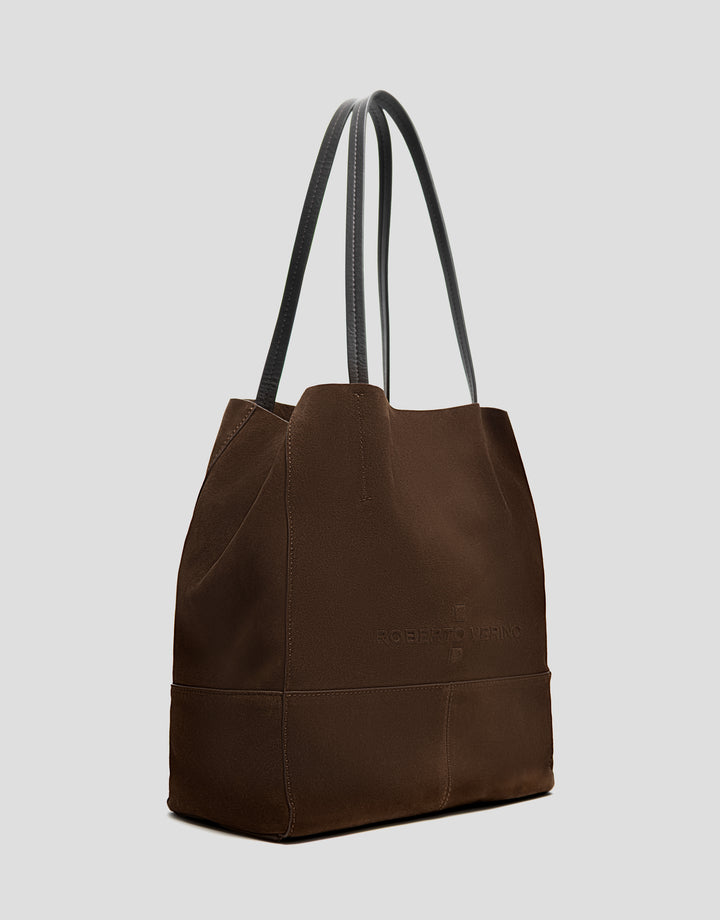 Brown tote bag with black handles on a light gray background