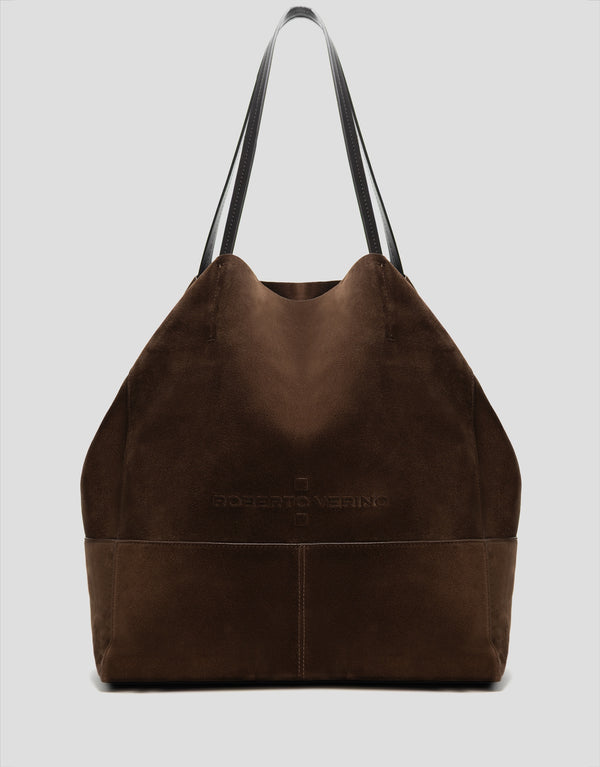 Brown leather tote bag with a visible brand logo on a light gray background