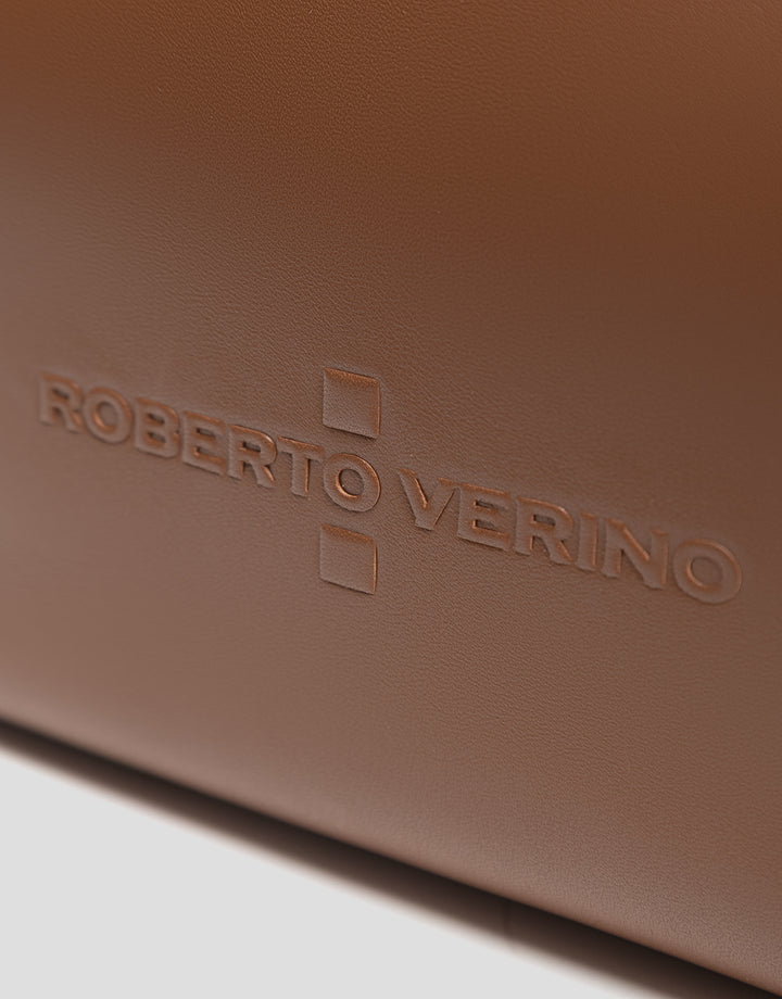 Close-up of a brown leather bag with 'Roberto Verino' branding.