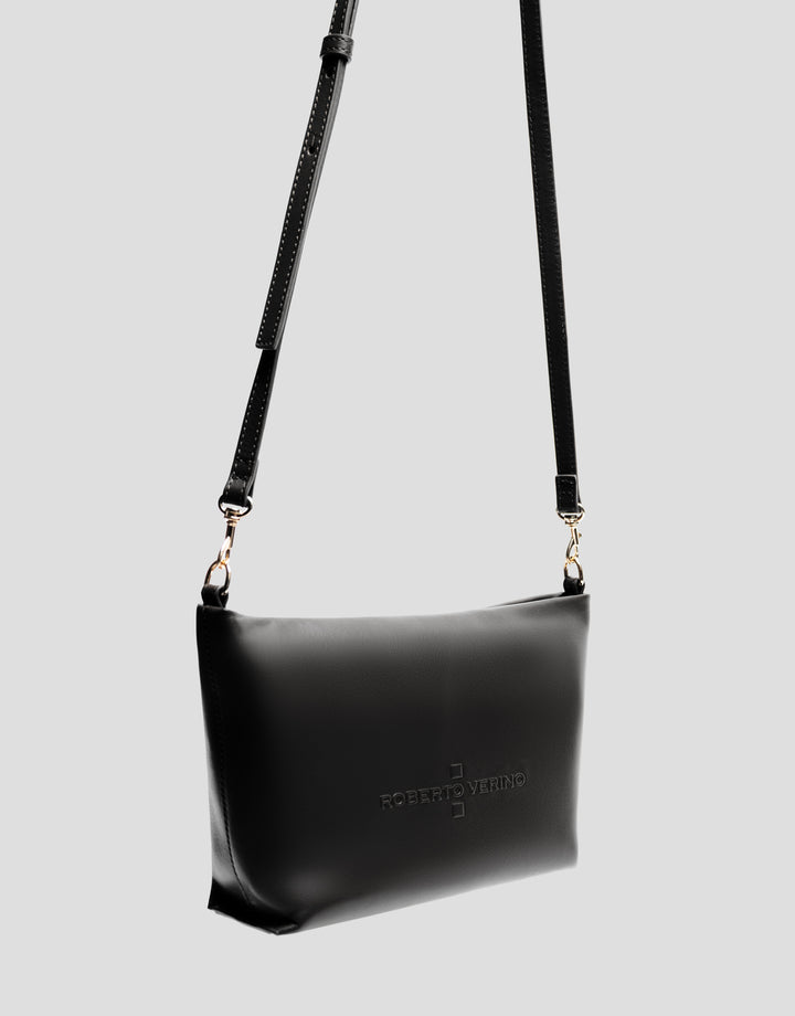 Black handbag with a strap on a light gray background