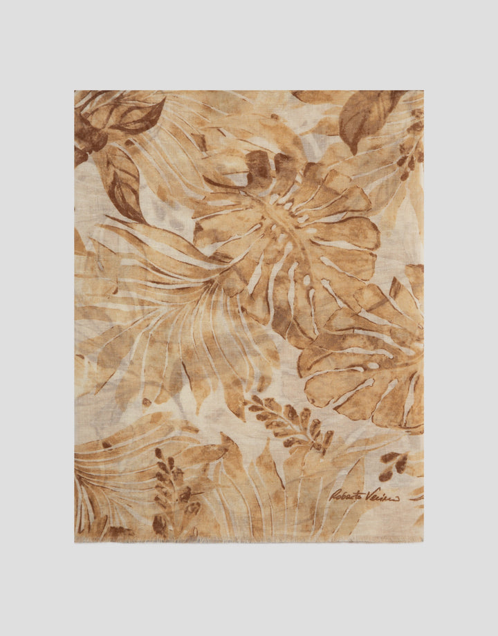 Floral patterned fabric swatch with brown and beige tones on a white background