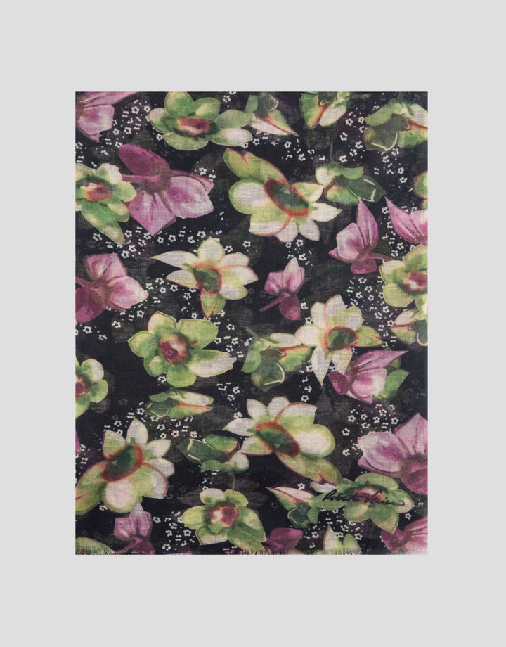 Floral patterned fabric with pink, green, and white flowers on a black background