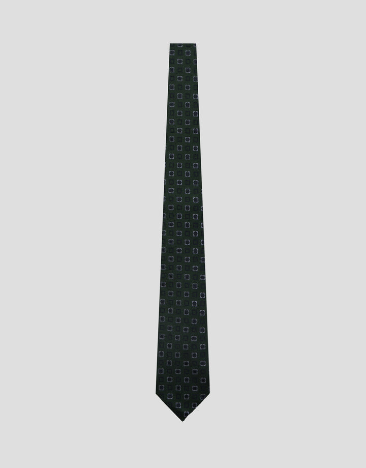 Black patterned tie on a light gray background