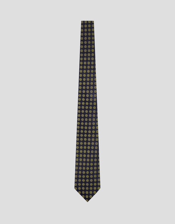 Patterned tie on a light gray background