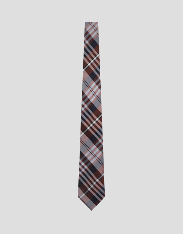 Plaid tie on a light gray background