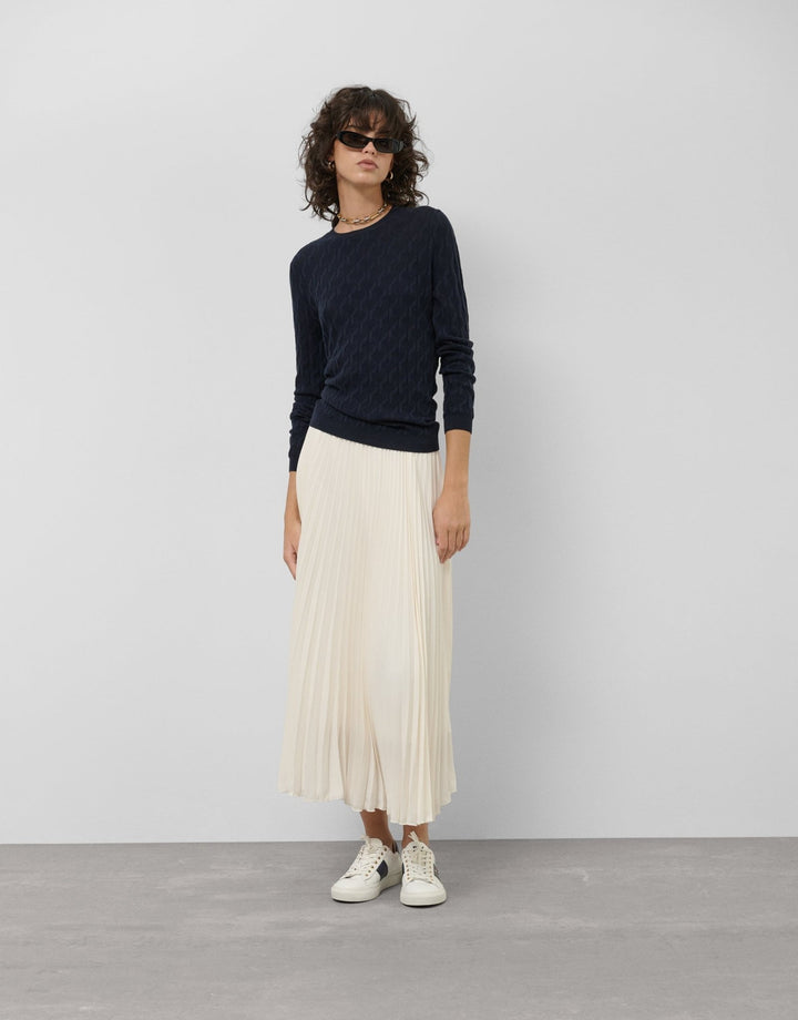Skirts | Beige fluid fabric, midi pleated skirt by Spanish designer Roberto Verino