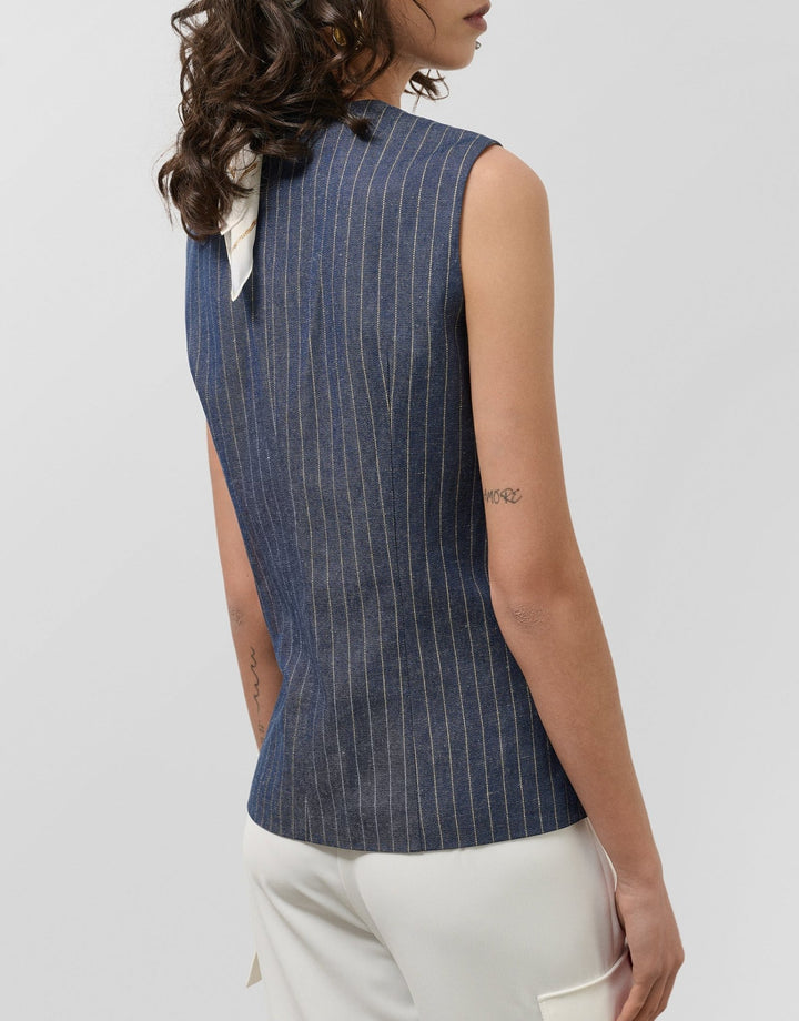 General | Blue denim and linen vest with gold outlines by Spanish designer Roberto Verino