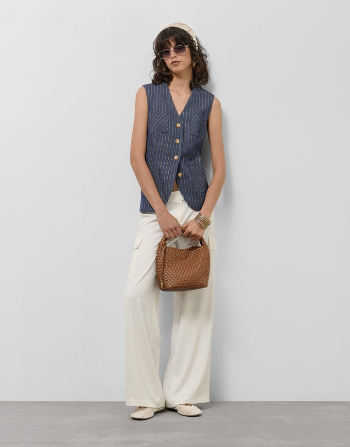 General | Blue denim and linen vest with gold outlines by Spanish designer Roberto Verino