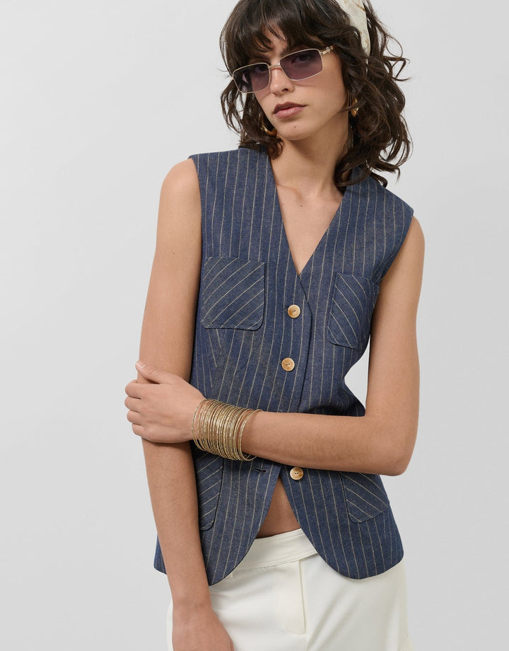 General | Blue denim and linen vest with gold outlines by Spanish designer Roberto Verino