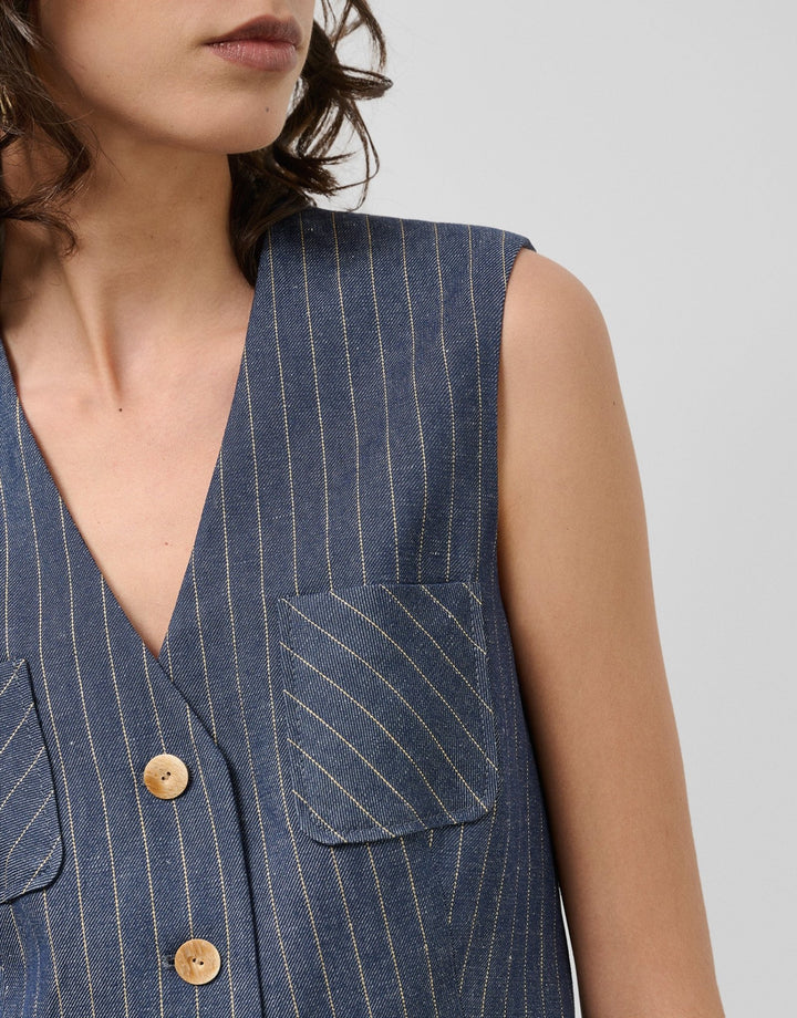 General | Blue denim and linen vest with gold outlines by Spanish designer Roberto Verino