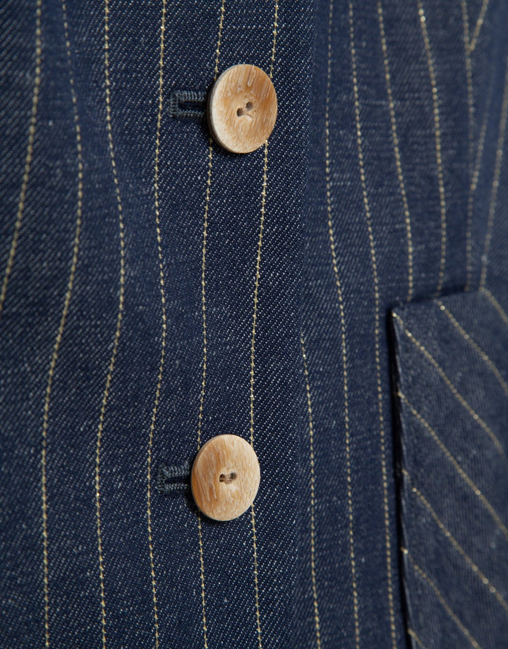 General | Blue denim and linen vest with gold outlines by Spanish designer Roberto Verino
