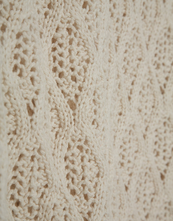 General | Cream knit sweater with long sleeves and a diamond design by Spanish designer Roberto Verino