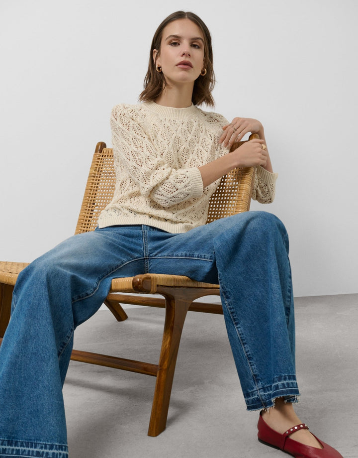 General | Cream knit sweater with long sleeves and a diamond design by Spanish designer Roberto Verino