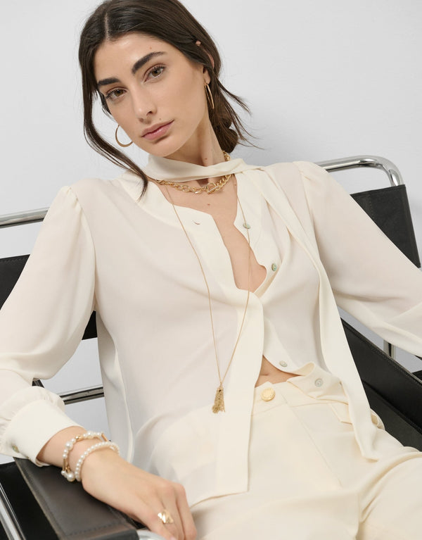 General | Cream oversize blouse with tie collar by Spanish designer Roberto Verino