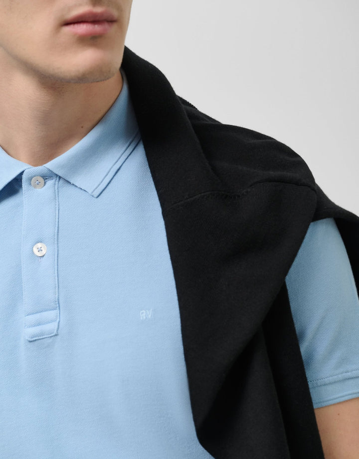 Polo Shirts | Light blue tinted piqué polo by Spanish designer Roberto Verino