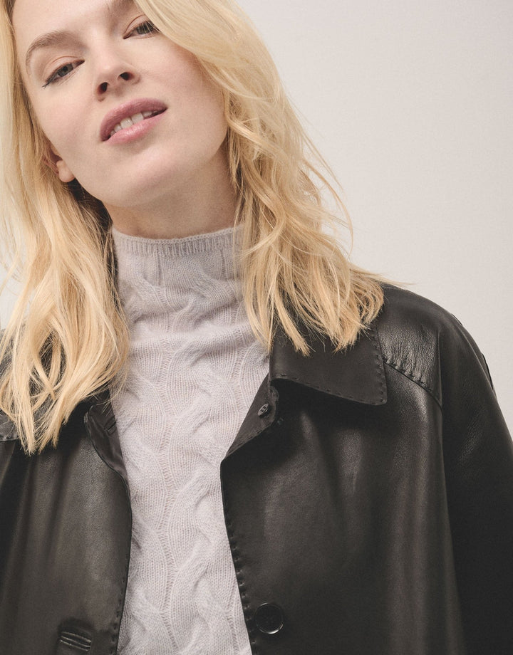 Outwear | Long black napa coat with ranglan sleeve by Spanish designer Roberto Verino