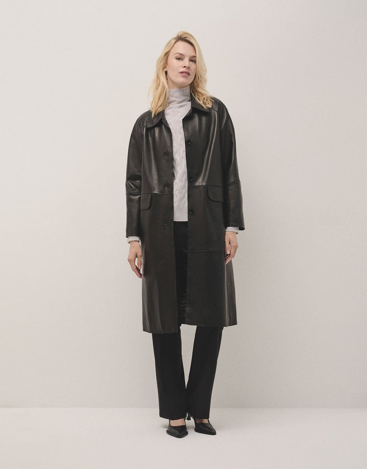 Outwear | Long black napa coat with ranglan sleeve by Spanish designer Roberto Verino