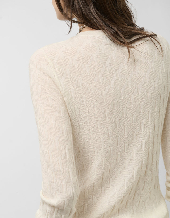 Knitwear | Long - sleeved wool sweater with raw eights by Spanish designer Roberto Verino