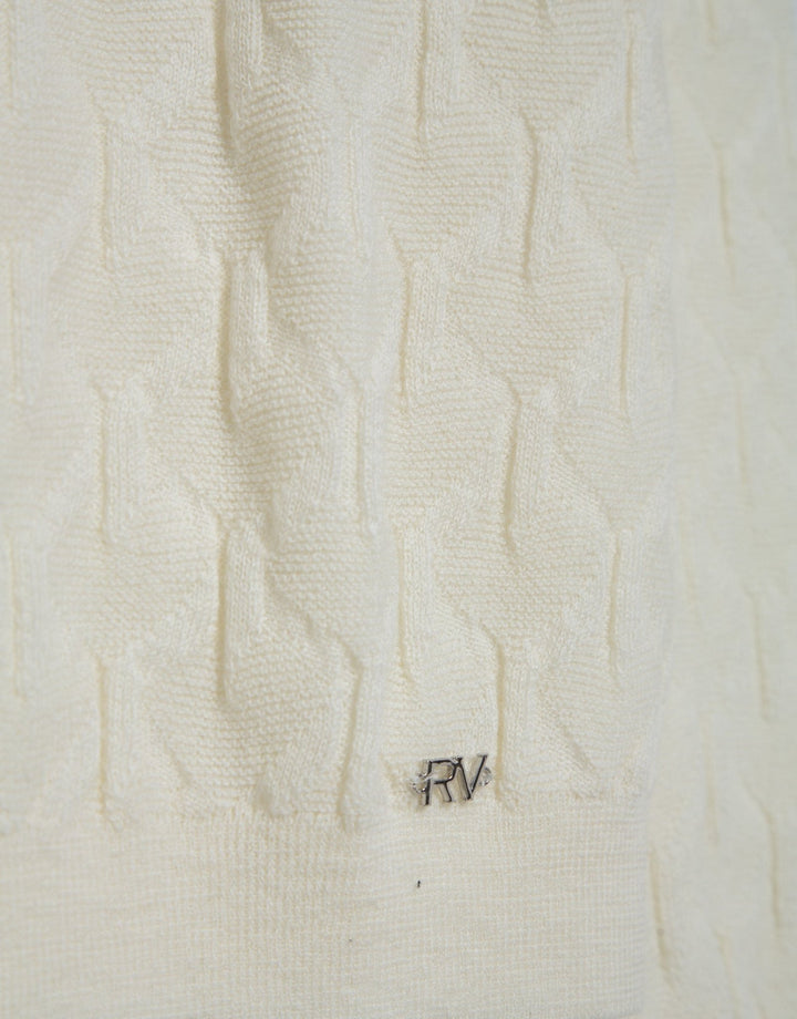 Knitwear | Long - sleeved wool sweater with raw eights by Spanish designer Roberto Verino