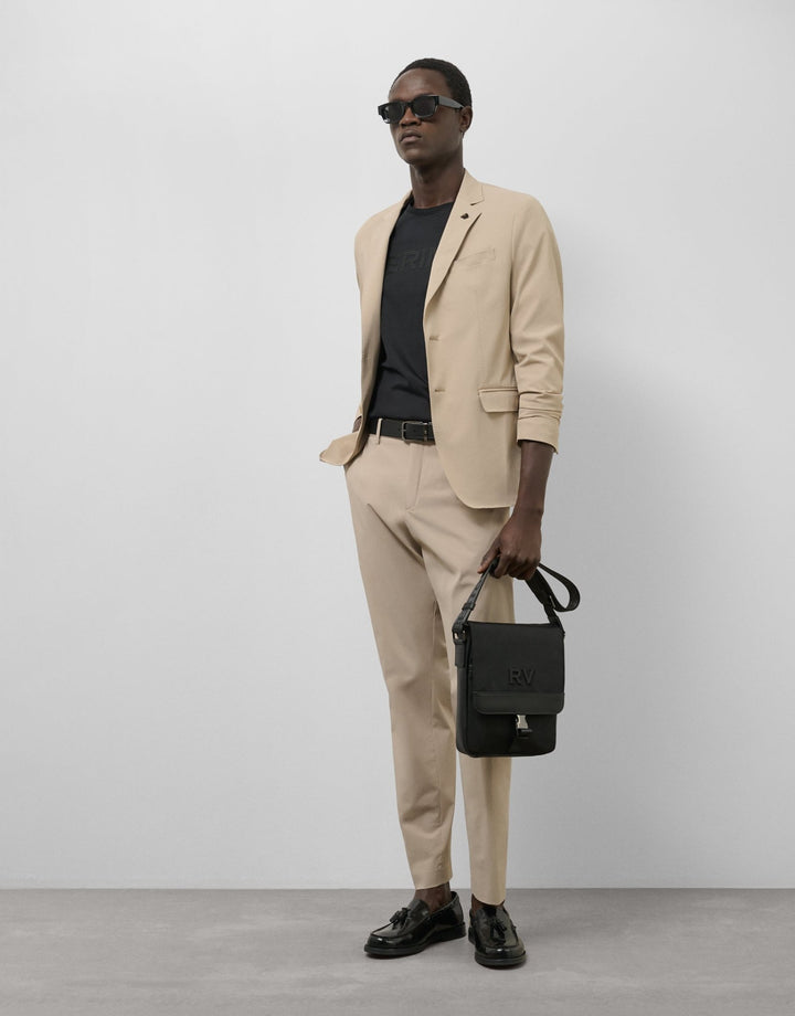 General | Medium sand technical separate pants by Spanish designer Roberto Verino
