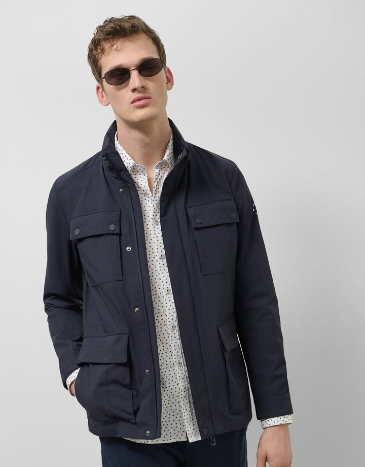 Outerwear | Navy four pocket parka by Spanish designer Roberto Verino