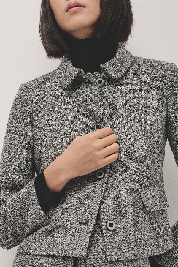 Knitwear | Short black and grey partridge eye jacket by Spanish designer Roberto Verino