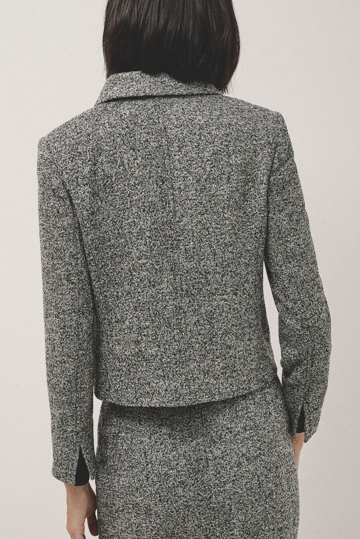 Knitwear | Short black and grey partridge eye jacket by Spanish designer Roberto Verino