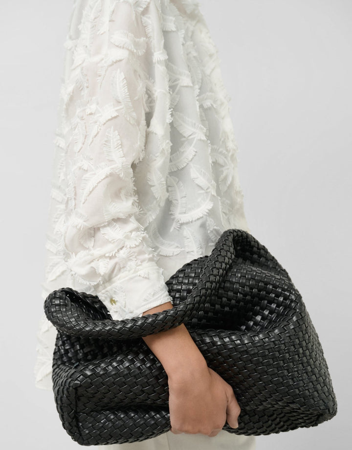 General | White cotton voile blouse with fill coupé feathers by Spanish designer Roberto Verino