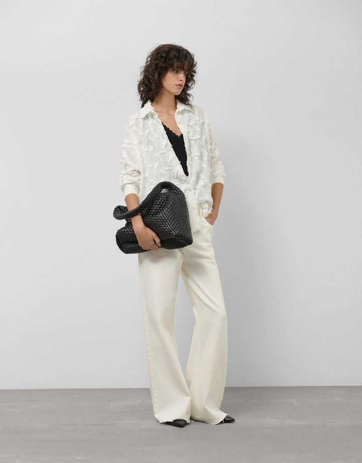 General | White cotton voile blouse with fill coupé feathers by Spanish designer Roberto Verino